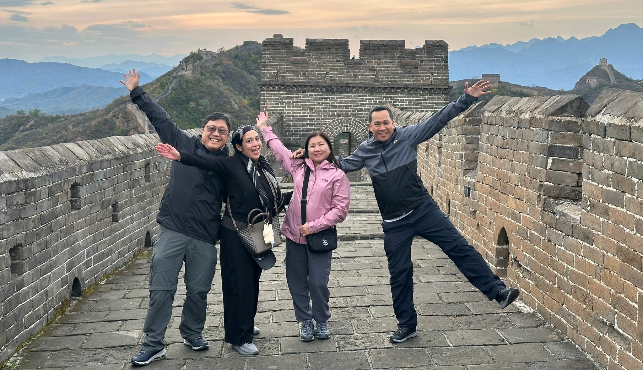 Why Asia is the Perfect Destination for Every Traveler in 2026 20 great wall with happy visitors e1763547965389